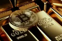 Біткоїн та Золото: Рекордні Інвестиції у Захисні Активи на тлі Боргу США